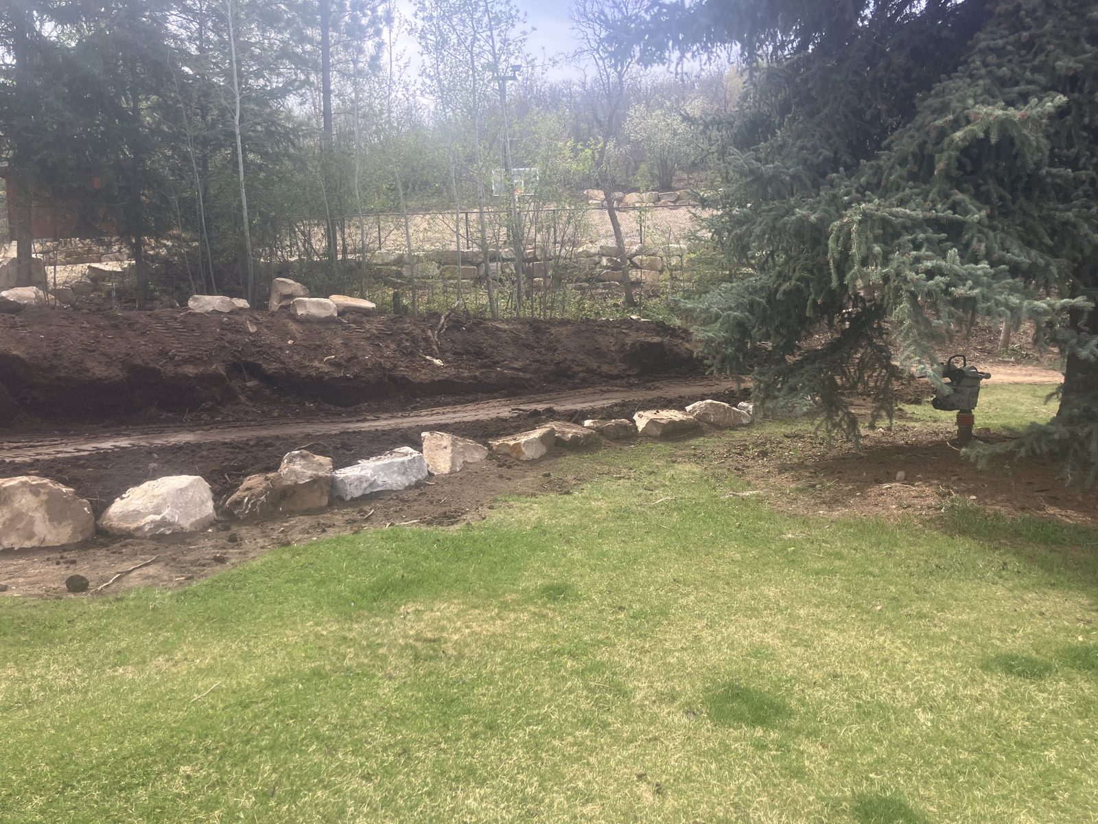 Finished stone retaining wall